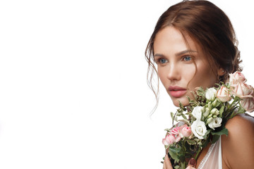Wall Mural - beautiful woman with classic nude make-up, light hairstyle and flowers. beauty face.