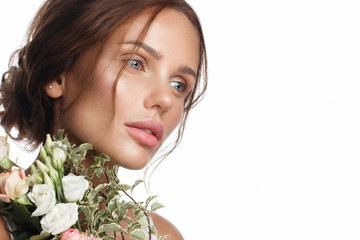 Wall Mural - beautiful woman with classic nude make-up, light hairstyle and flowers. beauty face.
