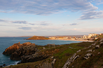 Wall Mural - Coastal landscape around Porthmeor Beach at St Ives in Cornwall at sunset