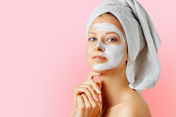 Wall Mural - cosmetology, skin care, face treatment, spa and natural beauty concept. woman with facial mask.