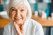 © Yakobchuk Olena - Lovely old woman looking at camera and smiling