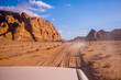 © Jiffy Photography - Wadi Ram desert with car., Red sand Dune in the Wadi Ram desert. Jordan landscape