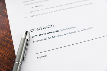 Wall Mural - Commercial contracts must be signed, simulated contract seen from above.