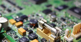 Fototapeta Paryż - Closeup of electronic circuit board or PCB printed circuit board