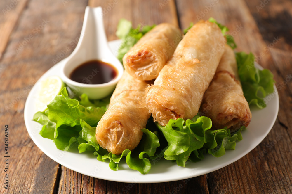 fried spring roll with soy sauce and lettuce - obrazy, fototapety, plakaty 