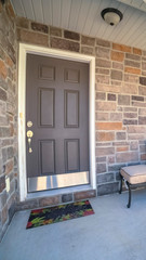 Wall Mural - Vertical frame Outdoor furniture on an entrance patio near sunset