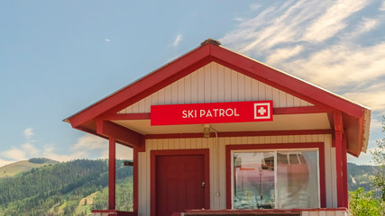 Wall Mural - Pano Wooden building for ski patrol in Park City Utah mountain resort at off season