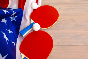 Wall Mural - Ping pong equipment on wooden table close up