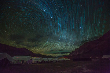 Wall Mural - stars trailing above indian himalaya near sarchu, india