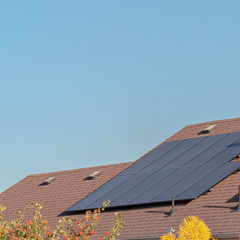 Poster - Square Photovoltaic solar panels on a house roof