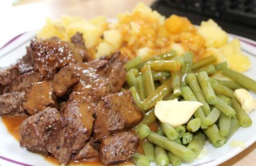 Home cooked Beef Goulash with Green beans and Potatos