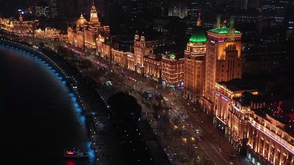 Wall Mural - Aerial view Shanghai at night  The Bund, The Bund in Shanghai is a famous waterfront area in central Shanghai at night, China.