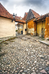 Fototapete - Old ruined walls of Tallinn