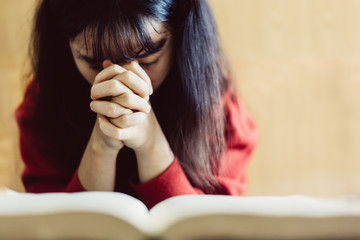 Poster - Soft focus Woman are praying and thanks to the Lord, girl prayer,copy space,sunday morning, devotion concept.