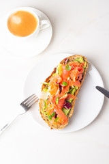 Wall Mural - toast with salmon, coffee and juice on a white 