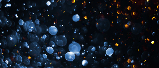 abstract bokeh background, colorful particles