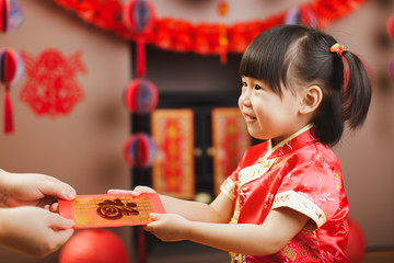 Chinese toddler girl  traditional dressing up with a 