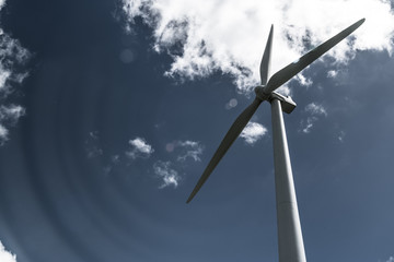 wind turbine against blue sky