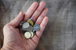 saving and saving money with coins on hand