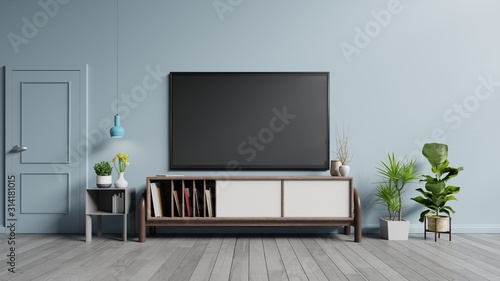 Fotomural Smart TV on the cabinet in modern living room on blue wall background