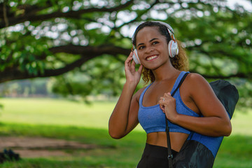 Wall Mural - portrait of african american woman having workout in park