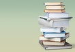 © BillionPhotos.com - Old vintage stack of books pastel background