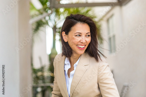 Cuadros en Lienzo Portrait of a confident Asian businesswoman smiling.