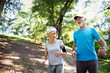 © NDABCREATIVITY - Happy mature people couple exercising for healthy life