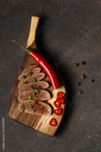 Fototapeta na szkło Beef tongue - sliced cooked cold tongue