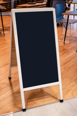 Wall Mural - Mock up Menu Chalkboard sign stand Blank Blackboard Cafe Restaurant