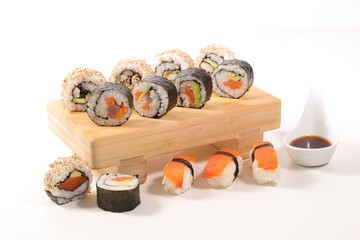 Wall Mural - assorted of maki, sushi and rolls with salmon, shrimp and avocado- japanese sushi food