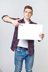 young man with a white background in his hands