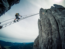 Via Ferrata Intersport Klettersteig - Climbing Up A Long Ladder