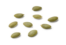 Raw Pumpkin Seeds Isolated On White Background.