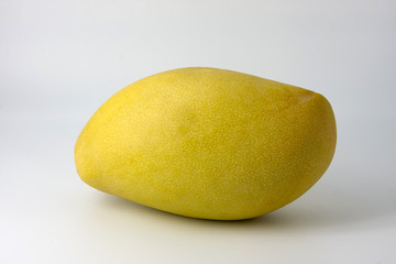 big yellow mango on a white background