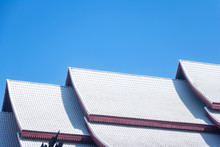 Thai Roof Church At Thai Temple.Roof Style Of Thai Temple Under Blue Sky. Architecture Of Roof, Thailand.