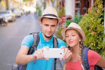 Wall Mural - Travelers using smart phone.