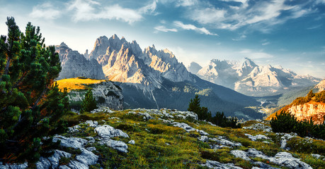 Incredible Colorful morning scene Over the Dolomites Alps during sunrise. Wonderful Nature Landscape. Awesome alpine highlands in sunny day. perfect sky ahd majestic mountains peaks under sunlight