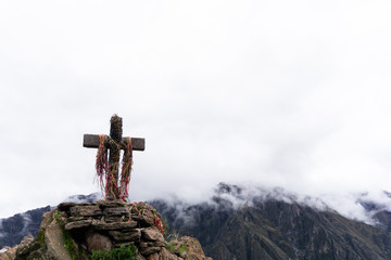 cross on top of mountain