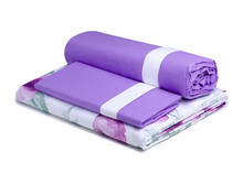Folded Purple Flower Pattern Bed Linens On White Background Isolation