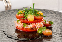 Crab Meat With Cherry Tomatoes And Greens, Served With Truffle Sauce