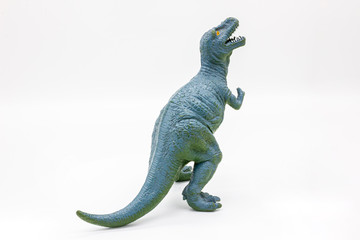 Plastic Dinosaur Isolated on White Background, Tyrannosaurus Rex Toy. 