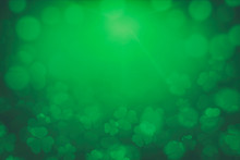Green Bokeh Lights Defocused For Design Patrick's Day Background