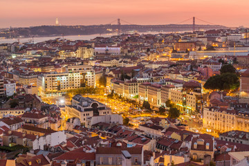 Wall Mural - Skyline of evening Lisbon from Miradouro da Graca viewpoint, Portugal