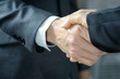 © Photo Sesaon - Holding hands with business partners to trust business partners, relationships to achieve future commercial and investment goals.