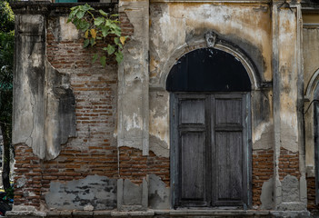 Wood vintage window on the old wall, Western Architecture style, Selective focus.