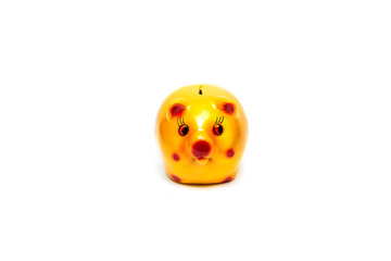 Front view of yellow piggy bank isolated on white. Piggy bank used for saving money for children.