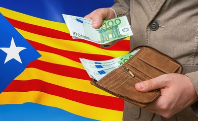 Wall Mural - Investing money to Catalonia. Rich man with a lot of money.