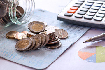 Coins placed on bank accounts, financial business concepts.