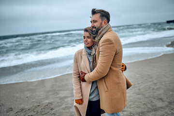 Family on the beach near the sea